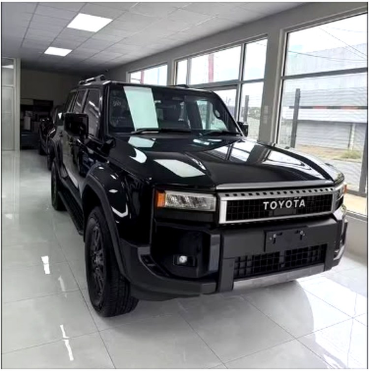 Black Toyota Land Cruiser 250 in the 89 Auto Collection showroom